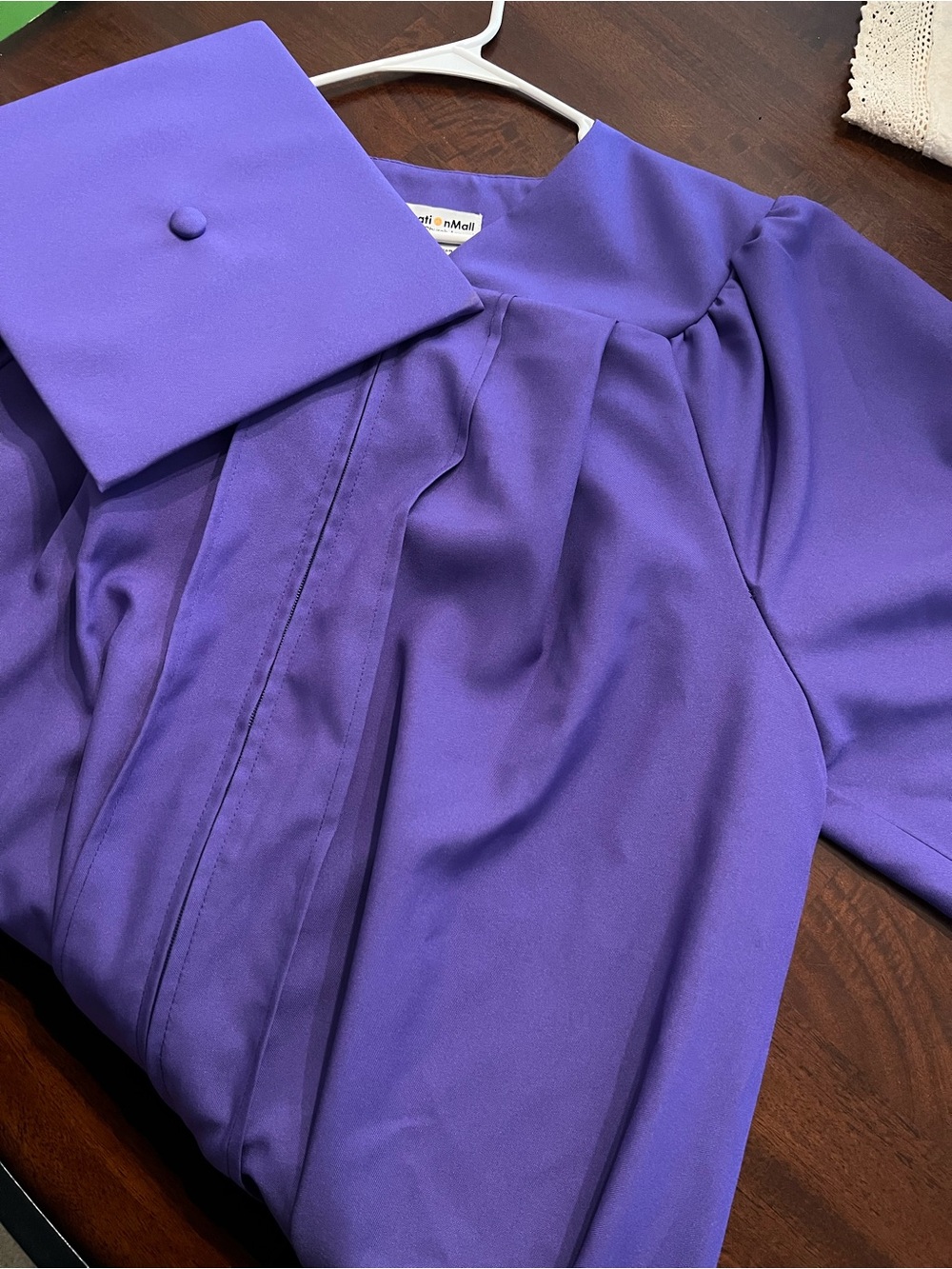 Purple Graduation Cap and Gown
